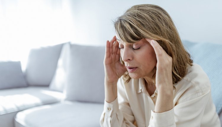 vrouw met hoofdpijn