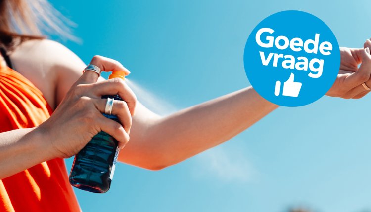 vrouw smeert zich in met zonnebrandcreme