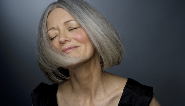 Grijzende vrouw Grijzende vrouw
