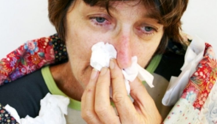 Verkouden vrouw
