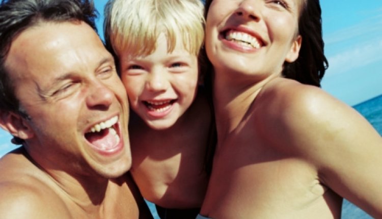 Familie op strand