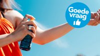 vrouw smeert zich in met zonnebrandcreme